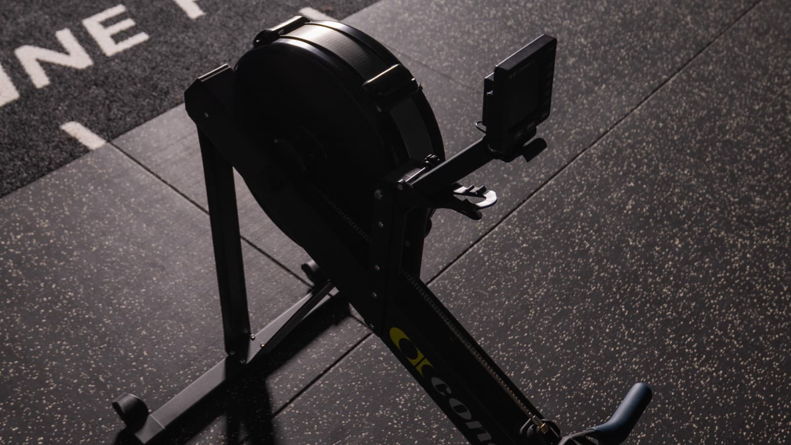The rower set up and ready on the studio floor